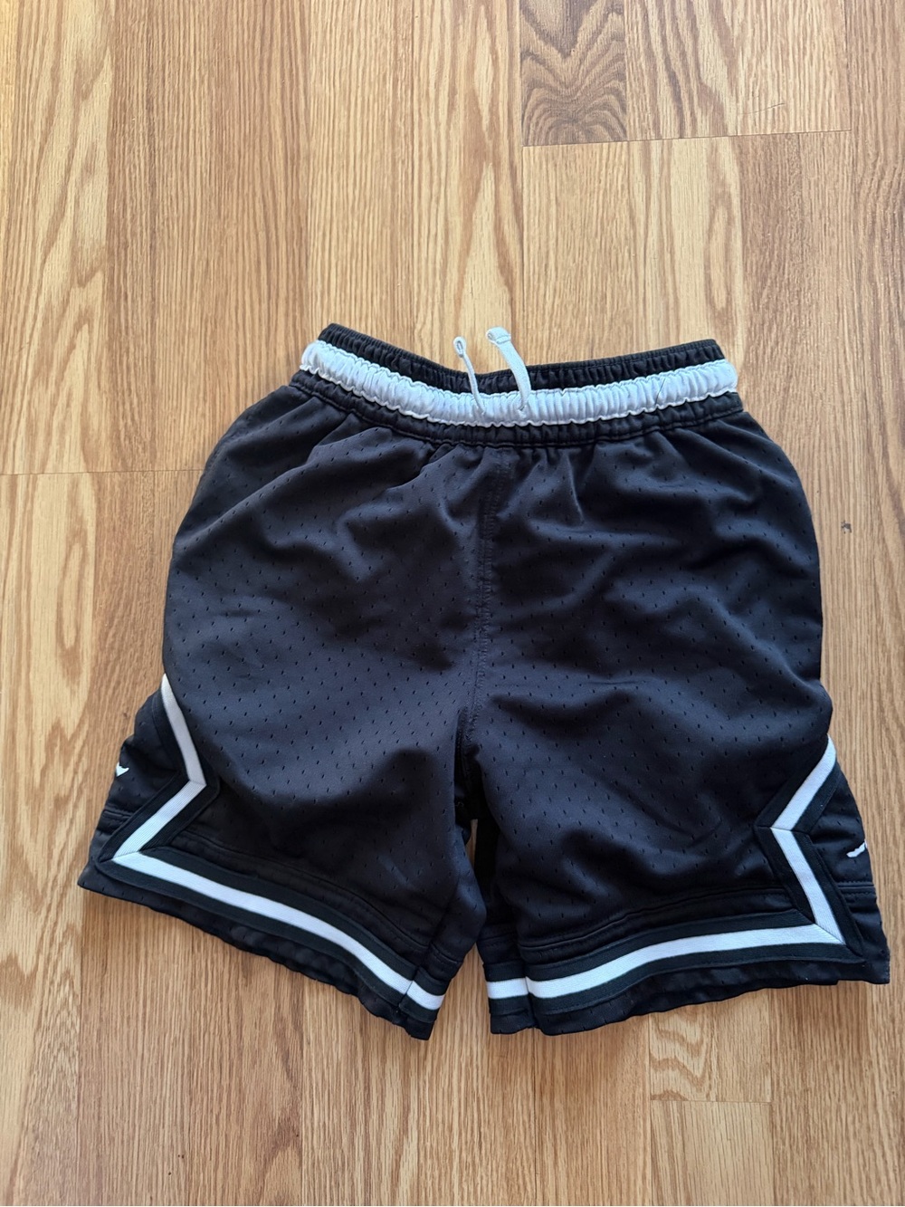 Kids Nike Black Athletic Shorts with White Trim